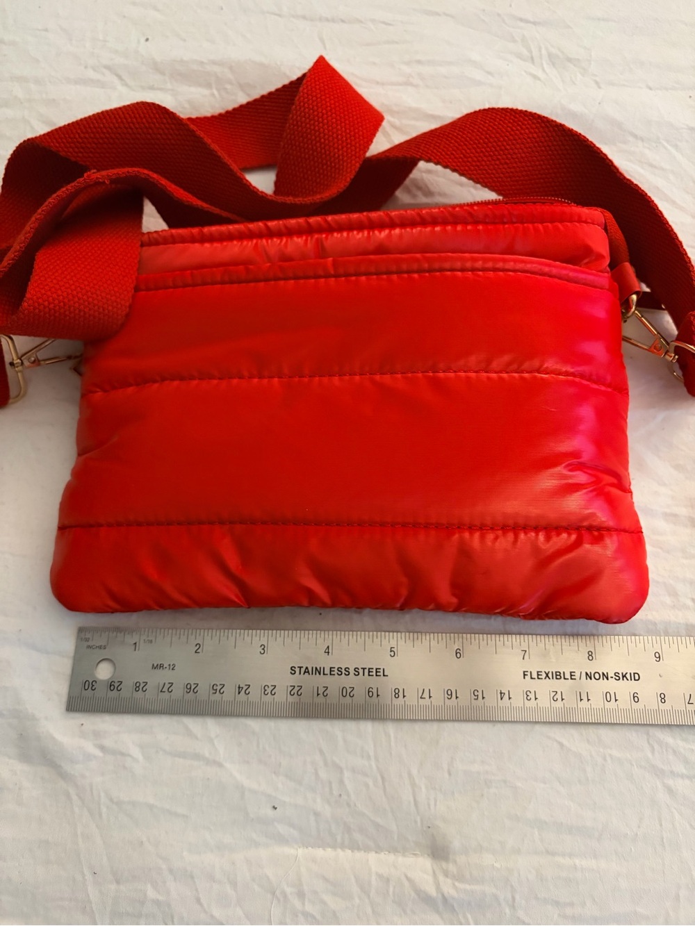 Compact Red Quilted Crossbody Bag with Wide Strap